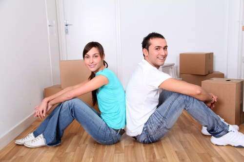 Professional movers handling office equipment during a Norbiton relocation